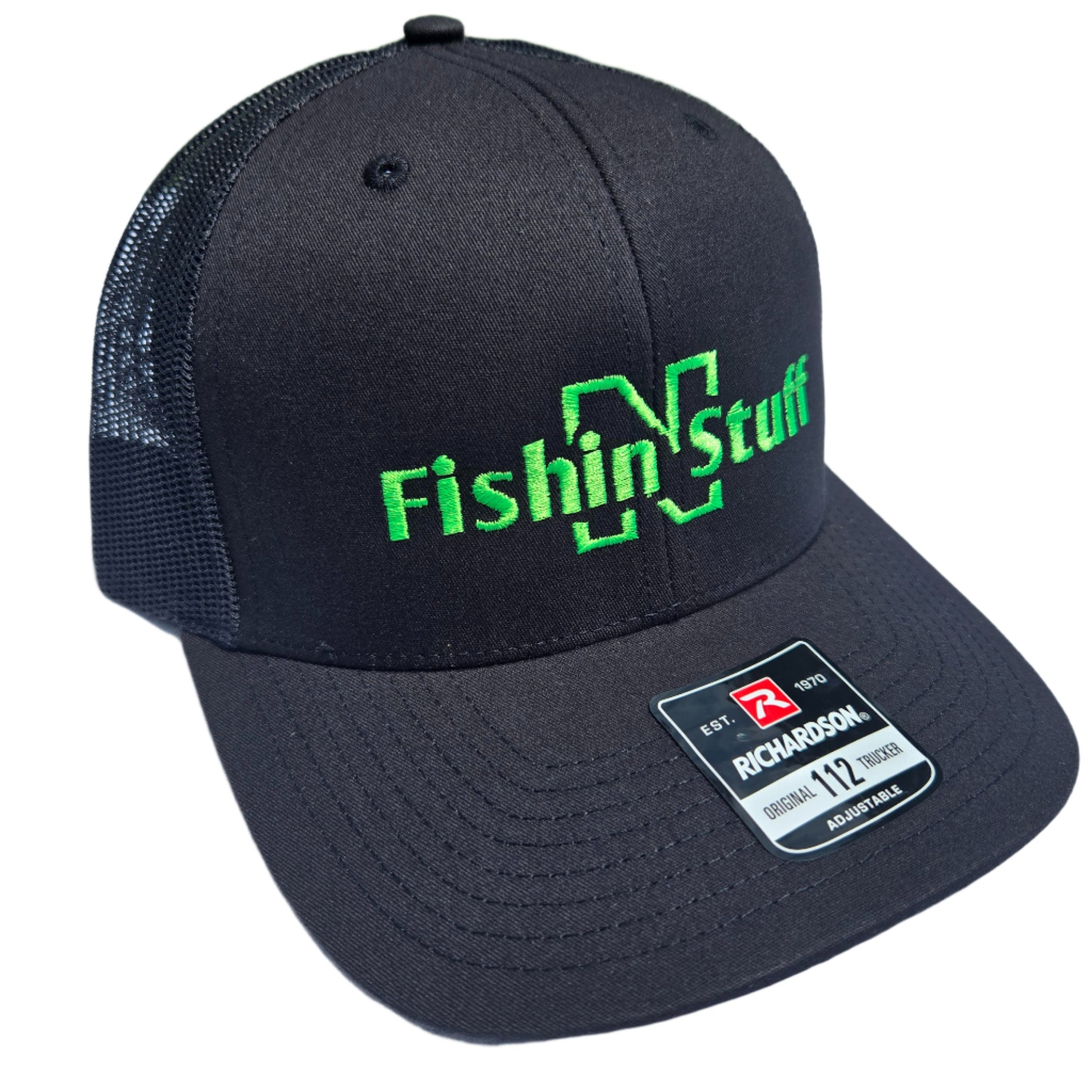 Black cap with green 'Fishing Stuff' text on a light gray surface